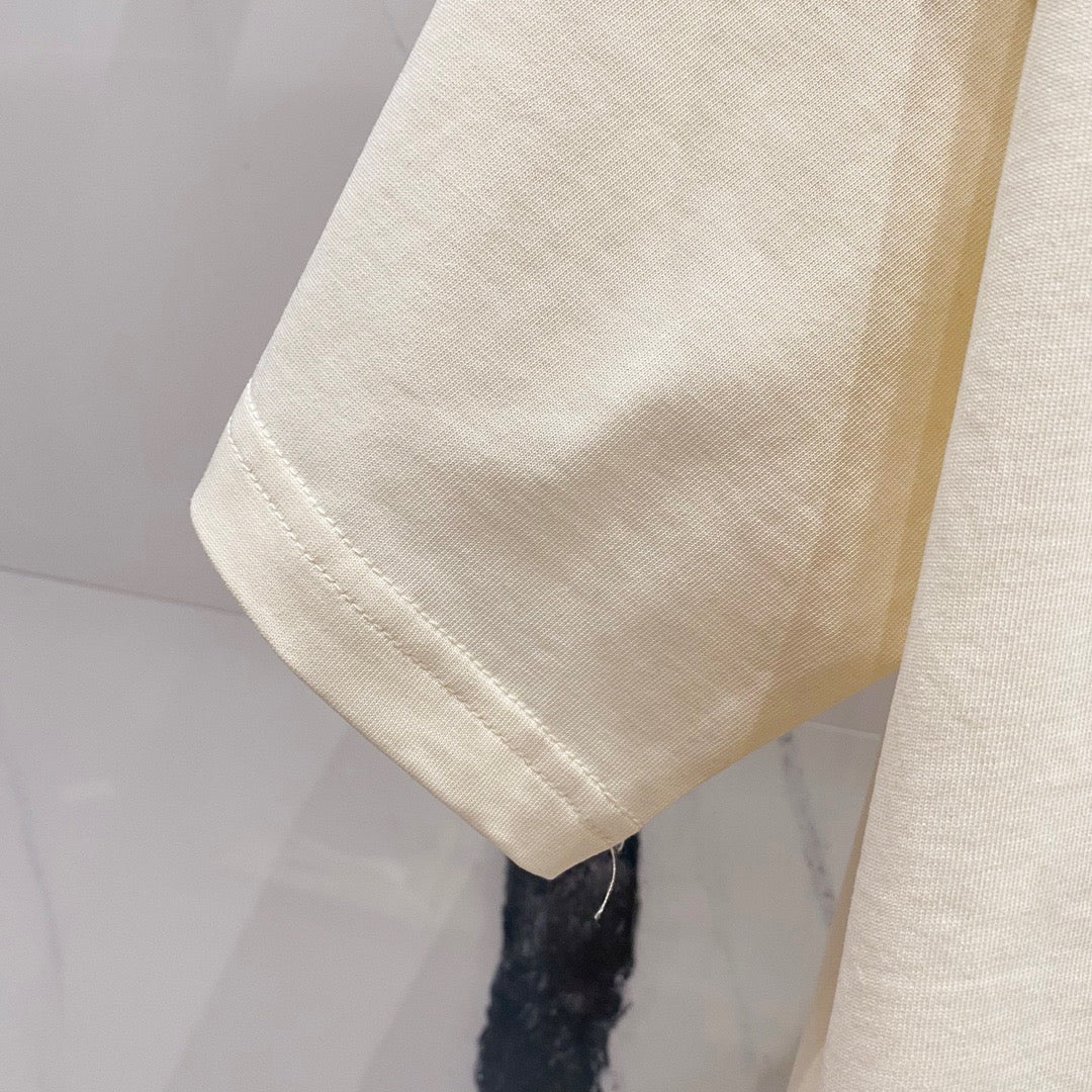GUCCI                                            Blade Logo Printed T-Shirt In Beige
