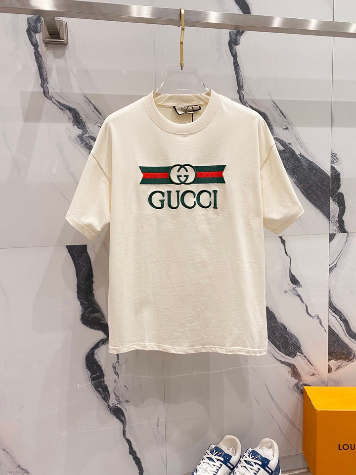 GUCCI                                            Blade Logo Printed T-Shirt In Beige
